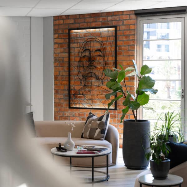 The sophisticated and modern reception area at LightSculpt Green Point in Cape Town, providing a tranquil setting for medical aesthetics consultations.