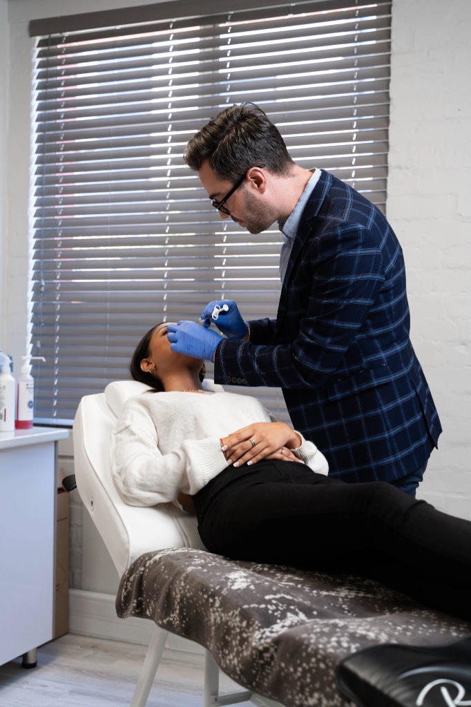 Dr Juan Bester administering dermal fillers at LightSculpt Green Point in Cape Town, using an anatomical approach to achieve natural, balanced facial results.