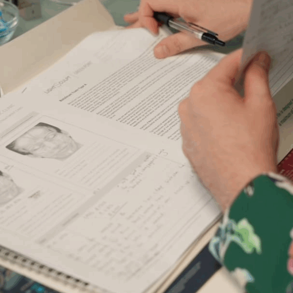 LightSculpt doctor reviewing a personalised aesthetic treatment plan during consultation.